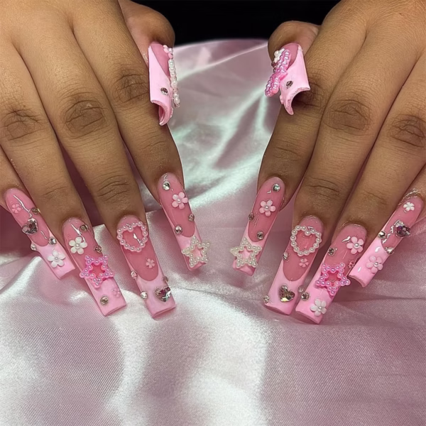 Handcrafted French Barbie Pink Nail Art with Rhinestones and Stars - Image 3