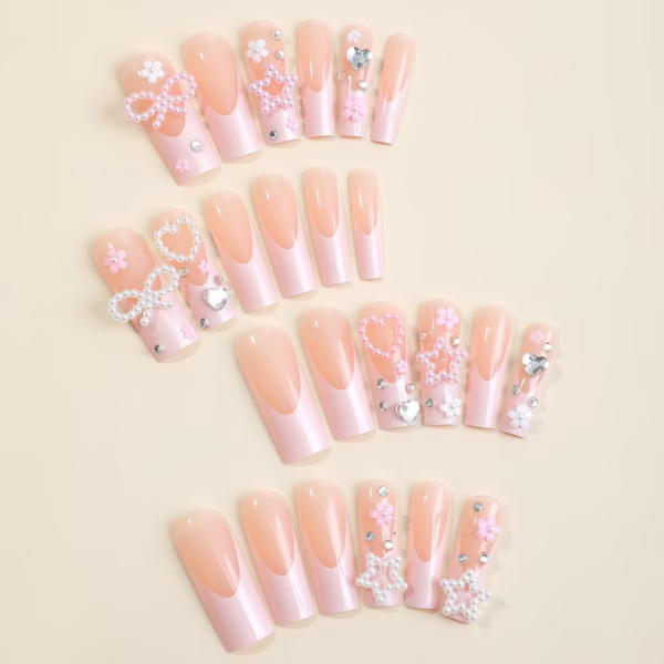 Handcrafted French Barbie Pink Nail Art with Rhinestones and Stars - Image 4